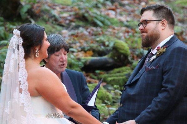 Outdoor amphitheater used for the ceremony (guests on benches)