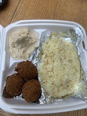 Vegetarian combo: Falafel, hummus, and rice substituted for the fattoush. Also comes with a huge, warm pita!