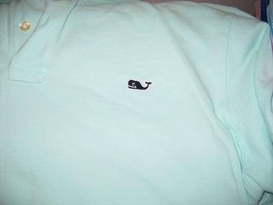 whale logo on shirt