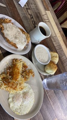 Chicken fried steak and eggs. Biscuits and gravy. Hash browns.