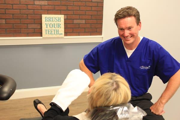 Dipping your hands in paraffin wax is one of the many ways we help you relax during your trip to the dentist.