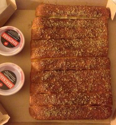 Double order of breadsticks - each order comes with a marinara sauce!