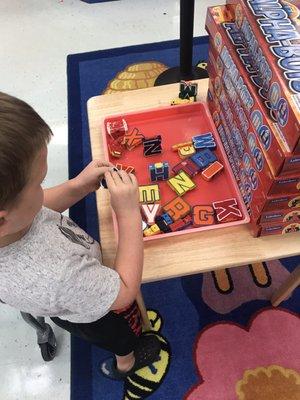 Tables set out to allow kids to play with the toy first