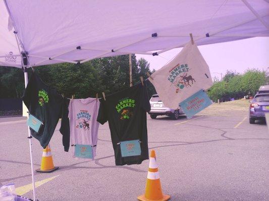 Booth for ANC Farmers Market in Lutheran church parking lot