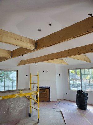 Finished painting the ceilings and priming. Waiting on painting and staining the finished trim and beams.