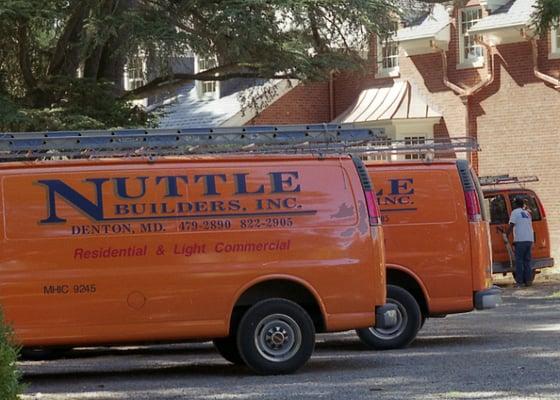 Nuttle Builders trucks on a jobsite.