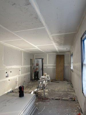 Drywall and taping in unit