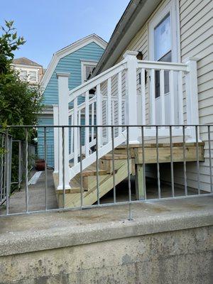 New pressure treated steps with vinyl railings for this client's beautiful cottage in Cape May!