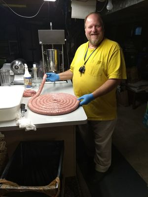 Making sausage with a friend, great hobby that pleases the whole family.