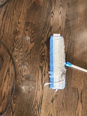 We use Bona Mop pads to detail clean the Hardwood Floors. Saver then an broom.