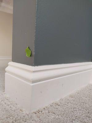 Damage to baseboard and paint