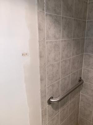 Broken tile was replaced in shower.