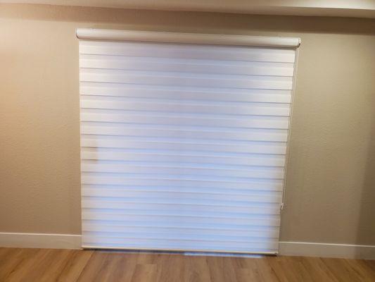 Zebra Roller shades light filtering