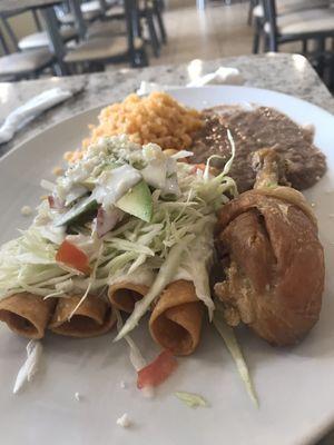 Tacos Dorados/ Flautas de Papa con pierna de Pollo, arroz y frijoles Crunchy Tacos with a chicken drumstick, rice and beans