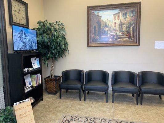 Waiting area-please take a seat to the right of these chairs to help me know you're here.