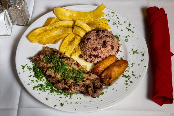 8oz churrasco, gallo pinto, maduros, and plantin chips