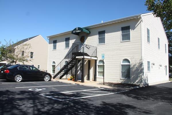 We have a private parking lot located behind the building, making the office easily accessible.