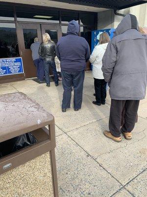 Elderly and women and children standing outside in 20 degree weather. FOR OVER AN HOUR!