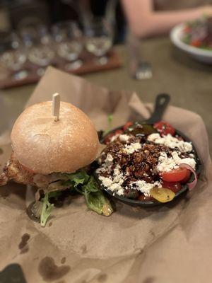 Grilled chicken sandwich with Village Tomato Salad