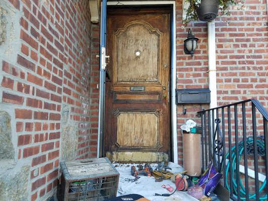 Door Before Repairs and Refinishing