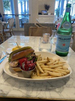 Grilled Mahi sandwich with a side of french fries