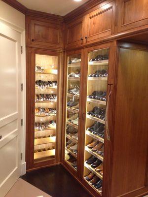 His master closet with belt storage cabinet