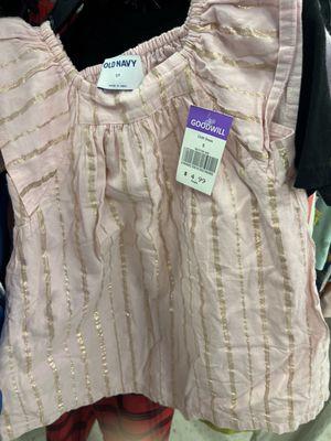 Another stained toddlers dress marked as a child's dress small for $4.99 instead of $1.99