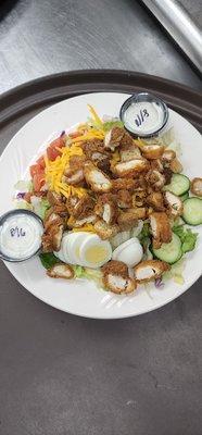 Parkhouse salad with fried chicken.