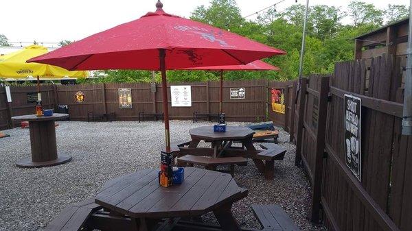 Large patio with upper and lower deck.