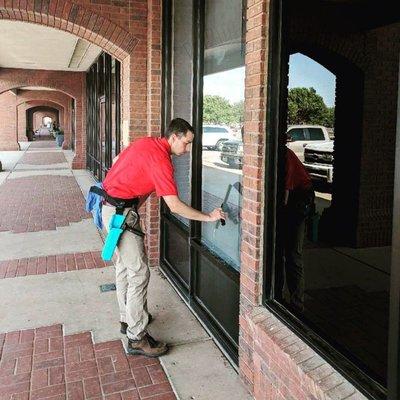 Storefront window cleaning services.