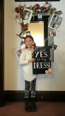 Out flower girl saying yes to her dress.