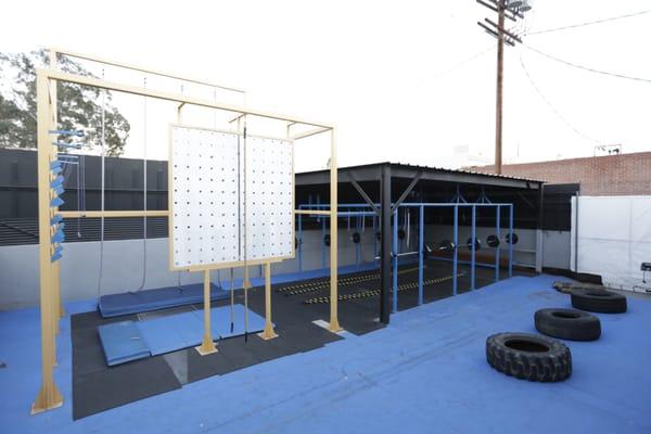 the BEAST  12'X8' peg board, 2 salmon ladders, 20' climbing ropes, 1 hand ropes, rings, squat racks, 3" steel balls, + MORE