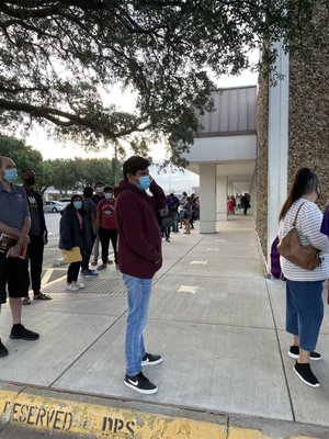 The line wraps around the building at 6:45 AM (6/4/2021) for people wanting a "same day" appointment.