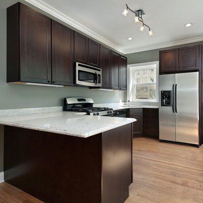 Espresso Shaker Cabinetry with White Countertop