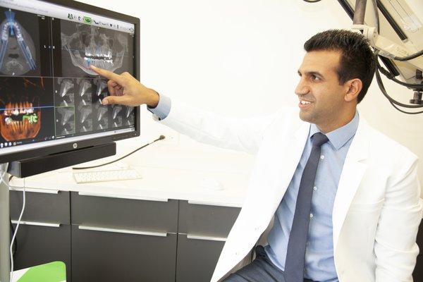 Dr. Justin Raanan reviewing CT Scan