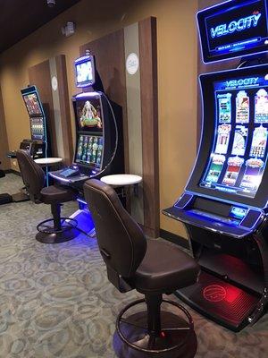 Game room with 5 Slot and video poker machines.