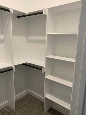 A complete closet remodel, double shelves and rods were installed as well as the storage shelves seen. All painted to match.