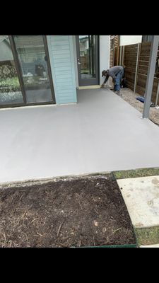 A L shaped patio going around the house