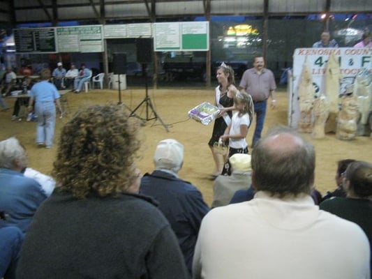 Baked goods auction and little and big sister showing off the goods.  The older girl was the fair princess!