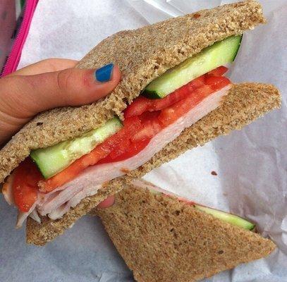 Turkey, cucumber, and tomato on honey whole wheat