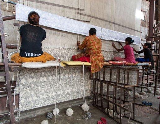 Kooches Indian Flower rug on loom in Kathmandu