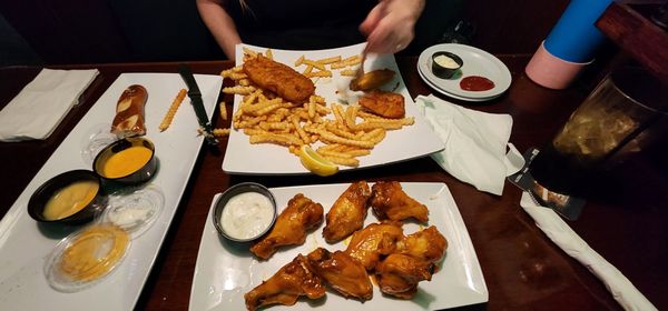 Frozen fish & chips, frozen fries. Wings are good