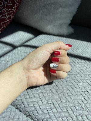 red gel nail manicure with spider web design