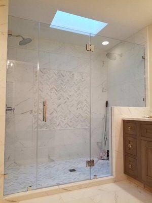 New Frameless shower door installation