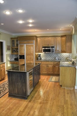 Kitchen Remodel - Full kitchen remodel with new solid wood flooring, granite counters and new cabinets.