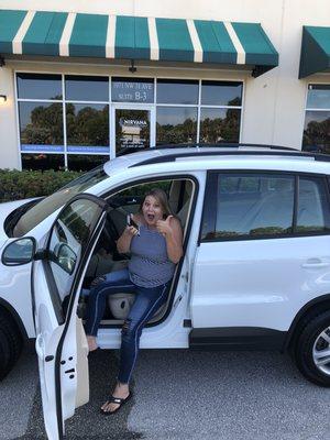 Excited client in her new SUV