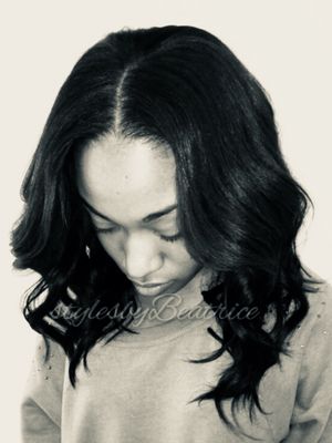 Natural sew-in with large curls