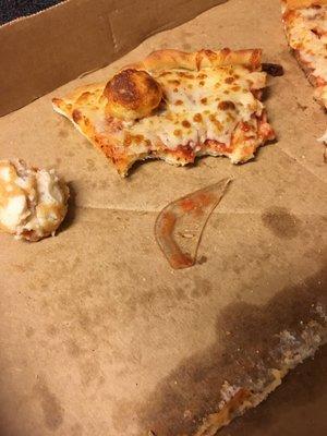 FOUND A PIECE OF PLASTIC IN OUR PIZZA! MY HUSBAND ALMOST ATE IT! ALSO, THE EMPLOYEES DON'T WEAR GLOVES OR HAIRNETS! NEVER GOING BACK!!!!