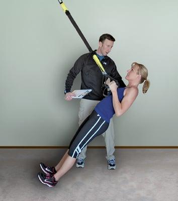 Suspension training for back strength and stability.