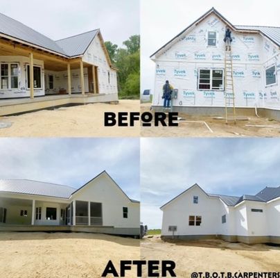 An installation of white siding along with facial all around the trusses as well as white trim.